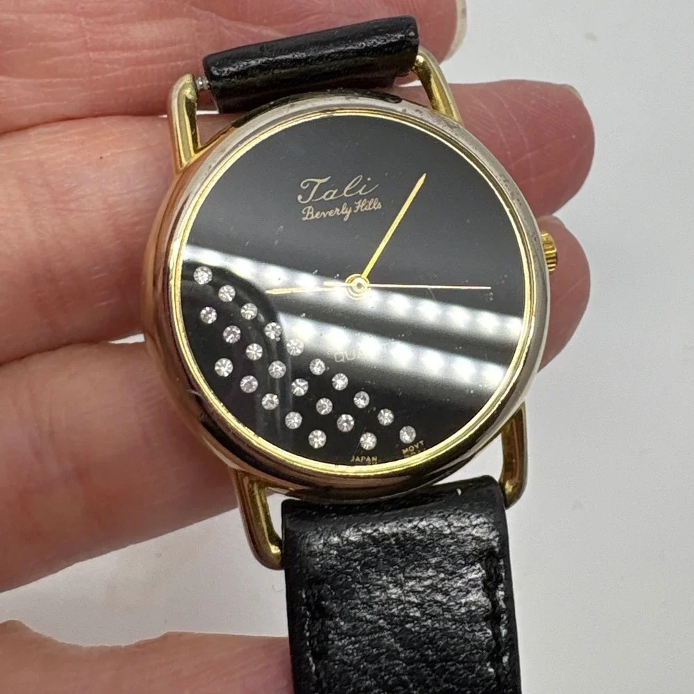 1980s Tali Beverly Hills Watch Rhinestone Accent Gold Tone Black‎ Face Quartz